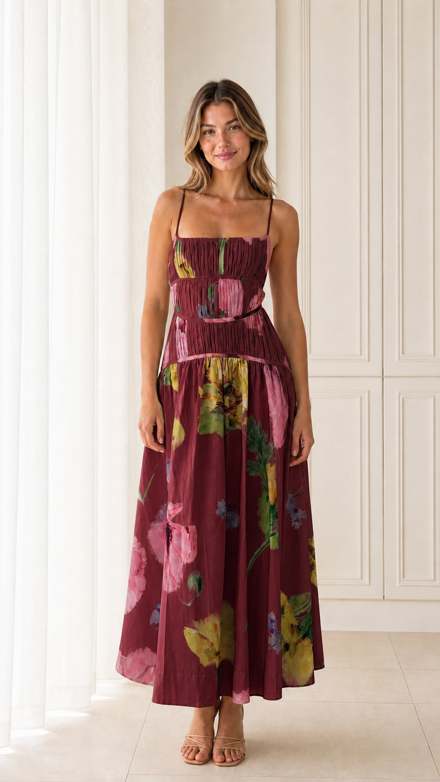 Front view of model wearing Burgundy floral smocked maxi dress