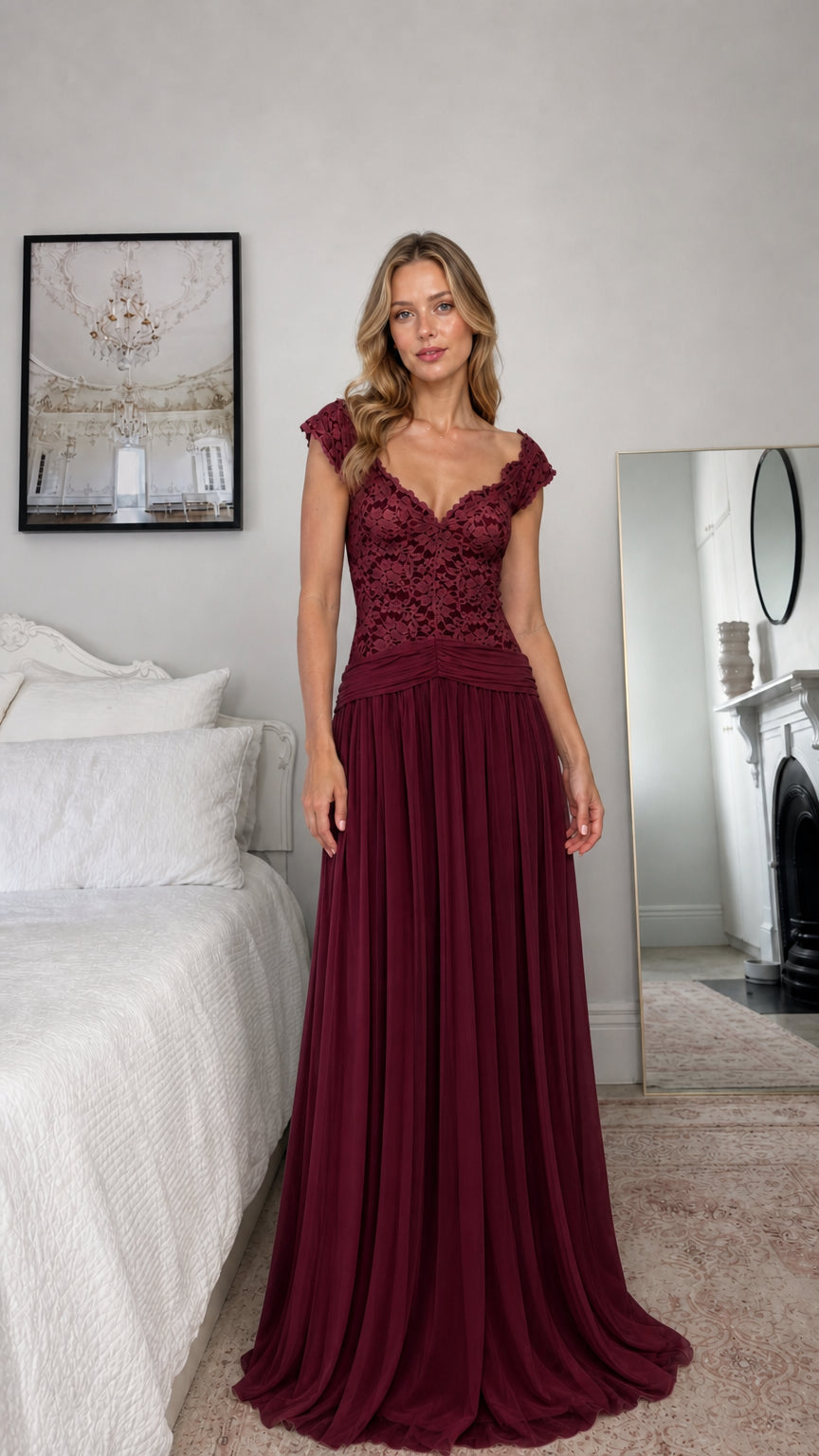Front view of model wearing burgundy lace evening dress