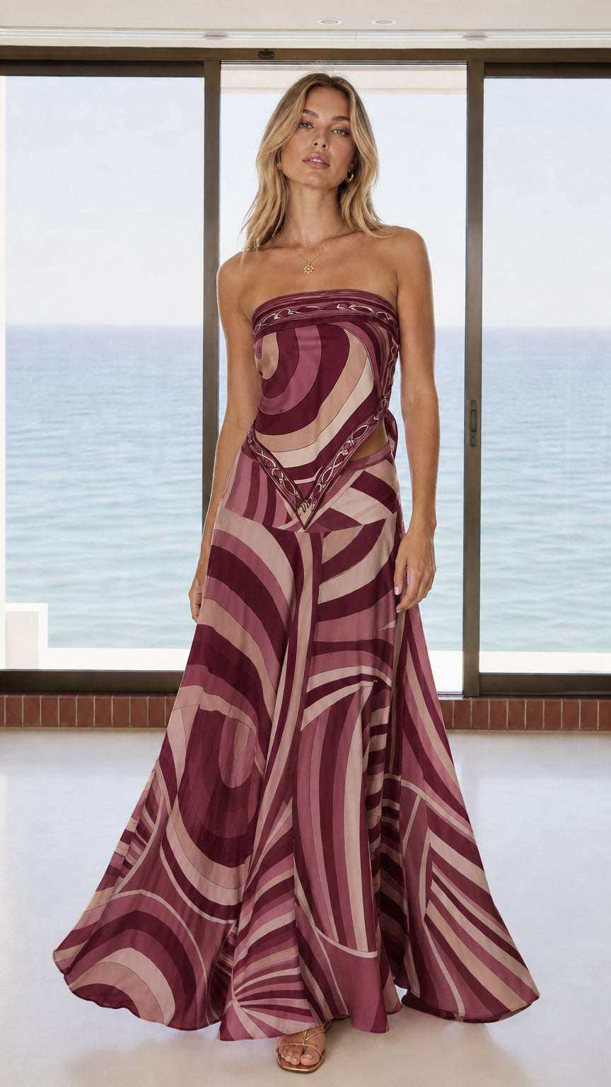Front view of woman wearing burgundy swirl print matching set