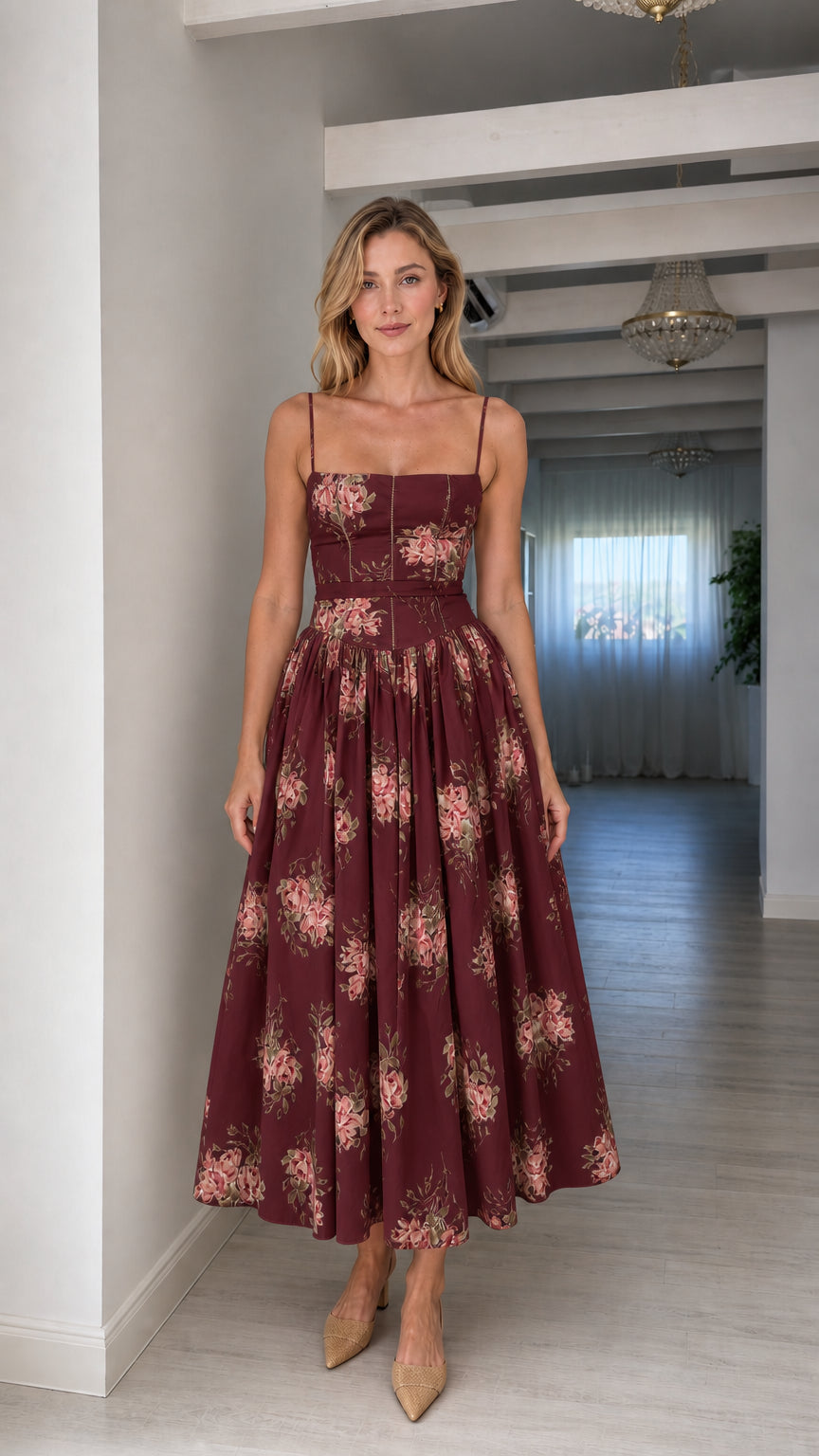 Woman wearing burgundy floral midi dress