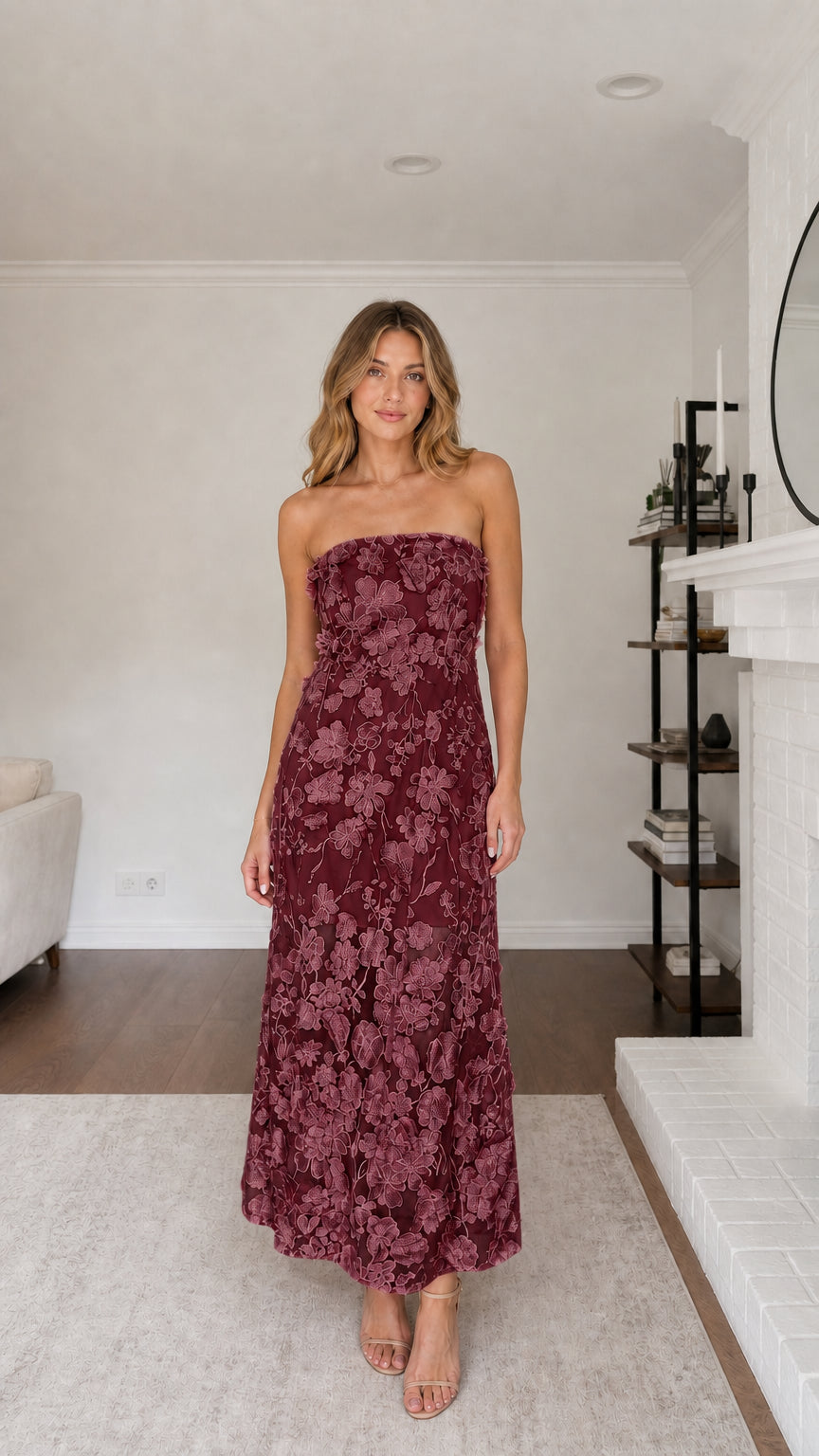 Full view of model wearing burgundy floral applique maxi dress