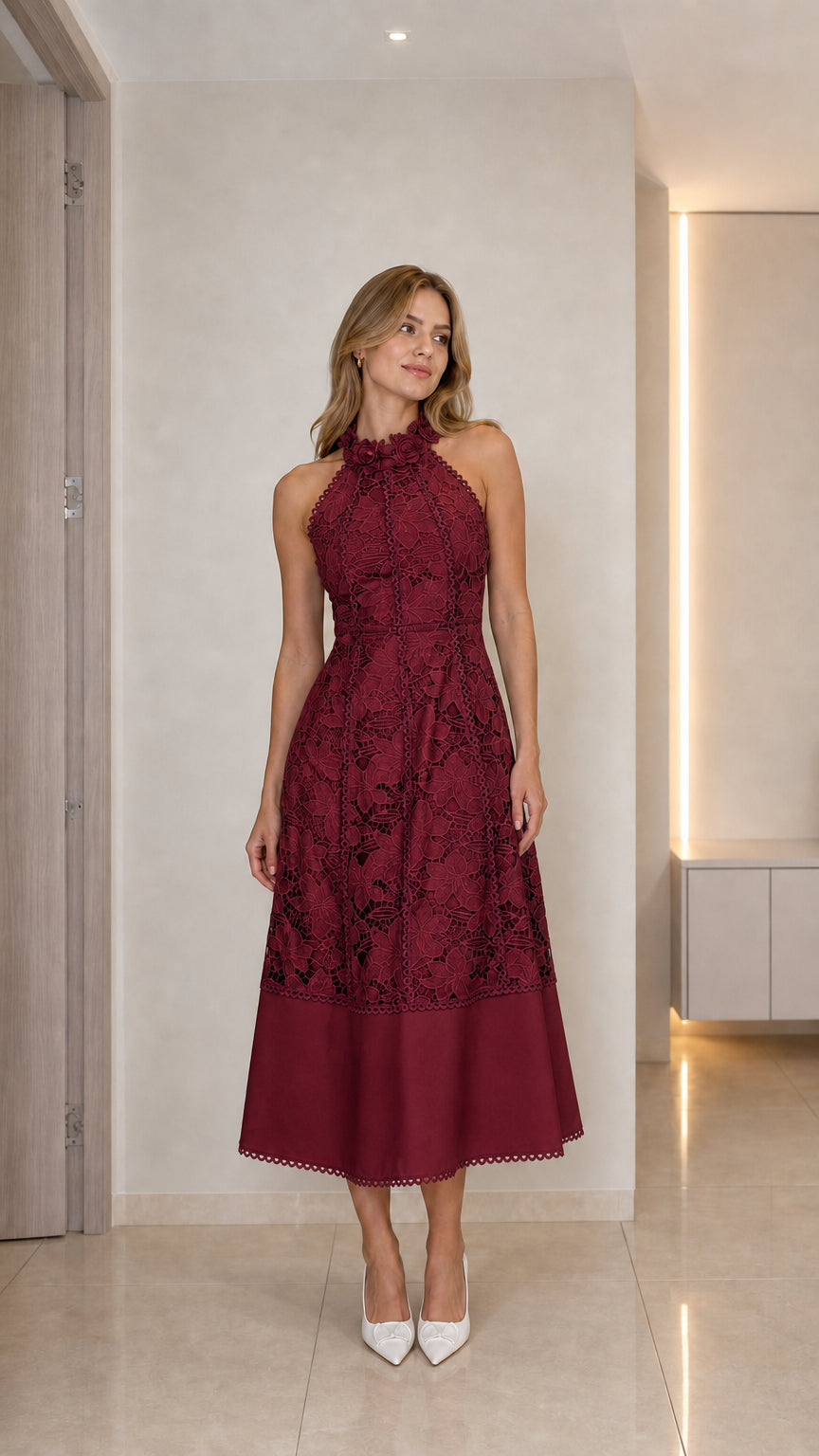 Model wearing burgundy halter neck floral lace midi dress