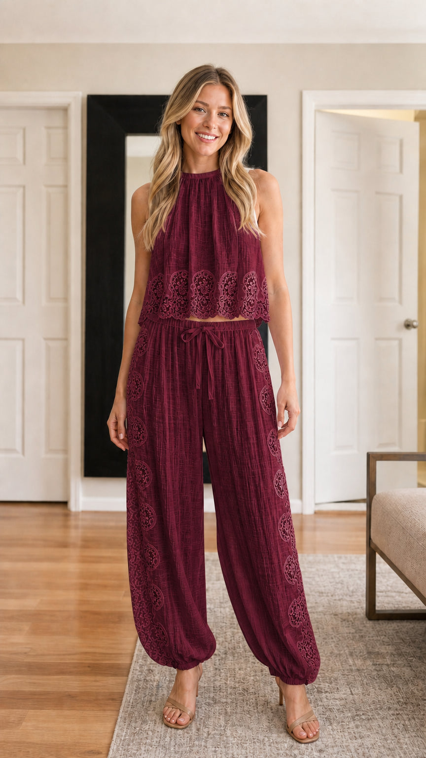 Model wearing burgundy two-piece set