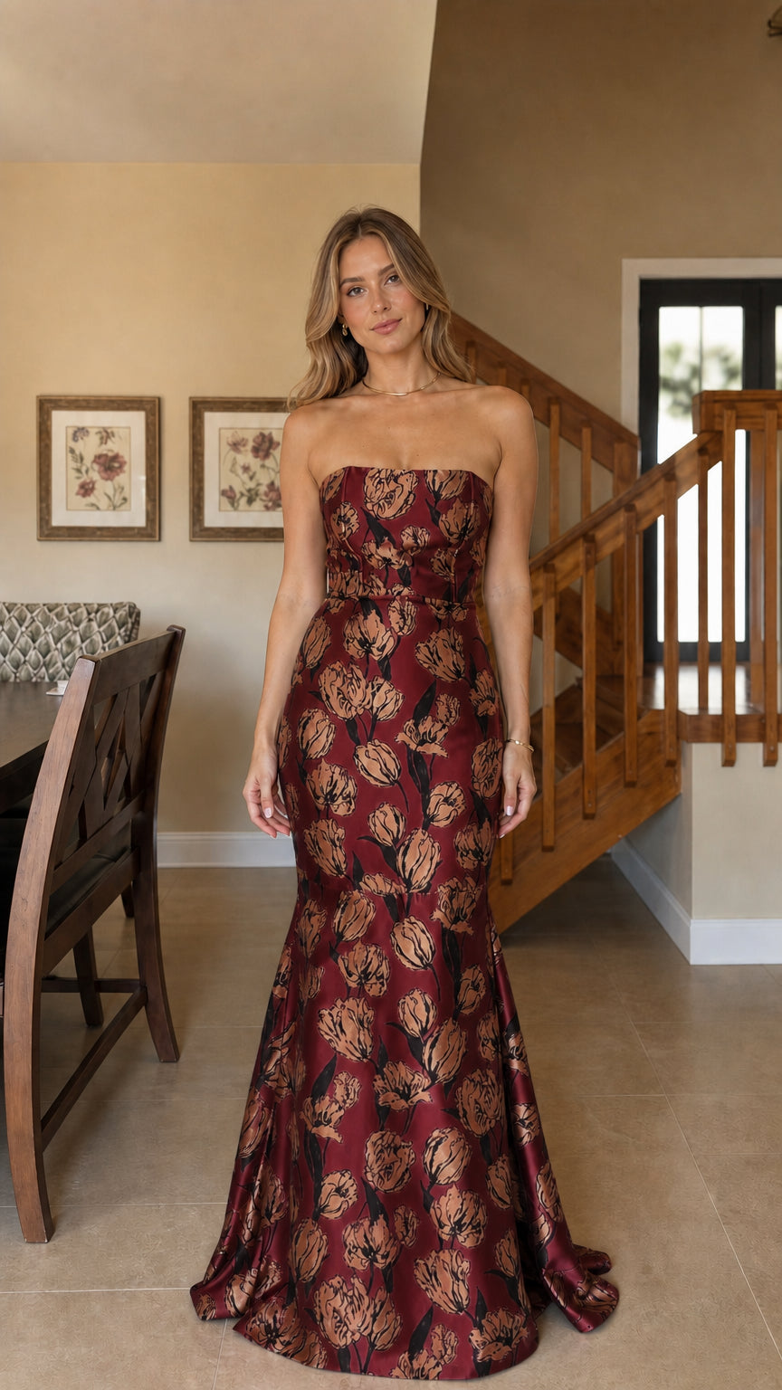Model wearing burgundy floral jacquard mermaid evening dress