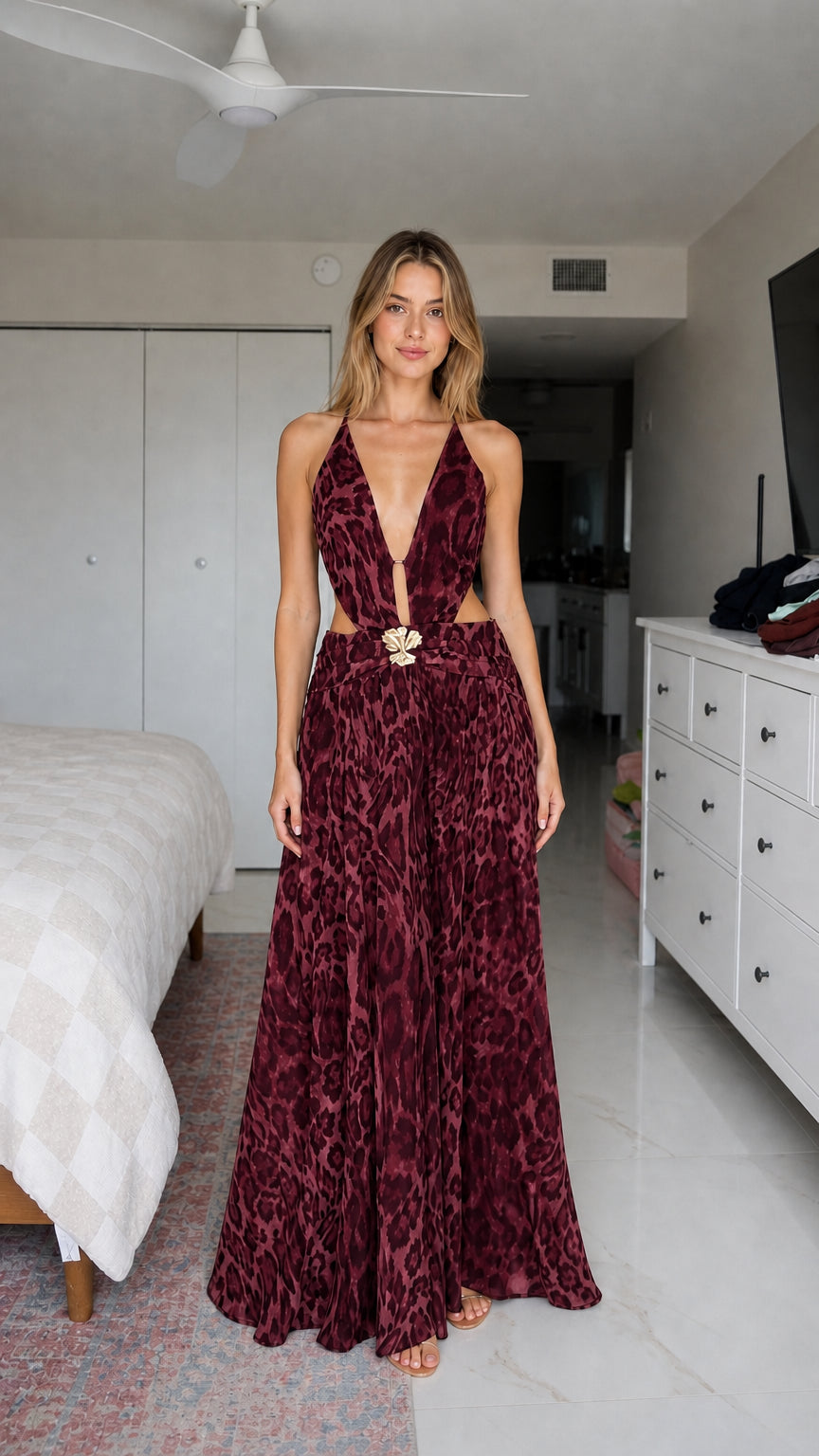 Front view of model wearing burgundy animal print maxi dress