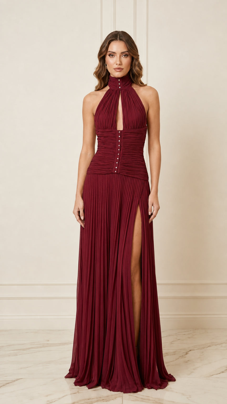 Front view of burgundy pleated halter evening dress
