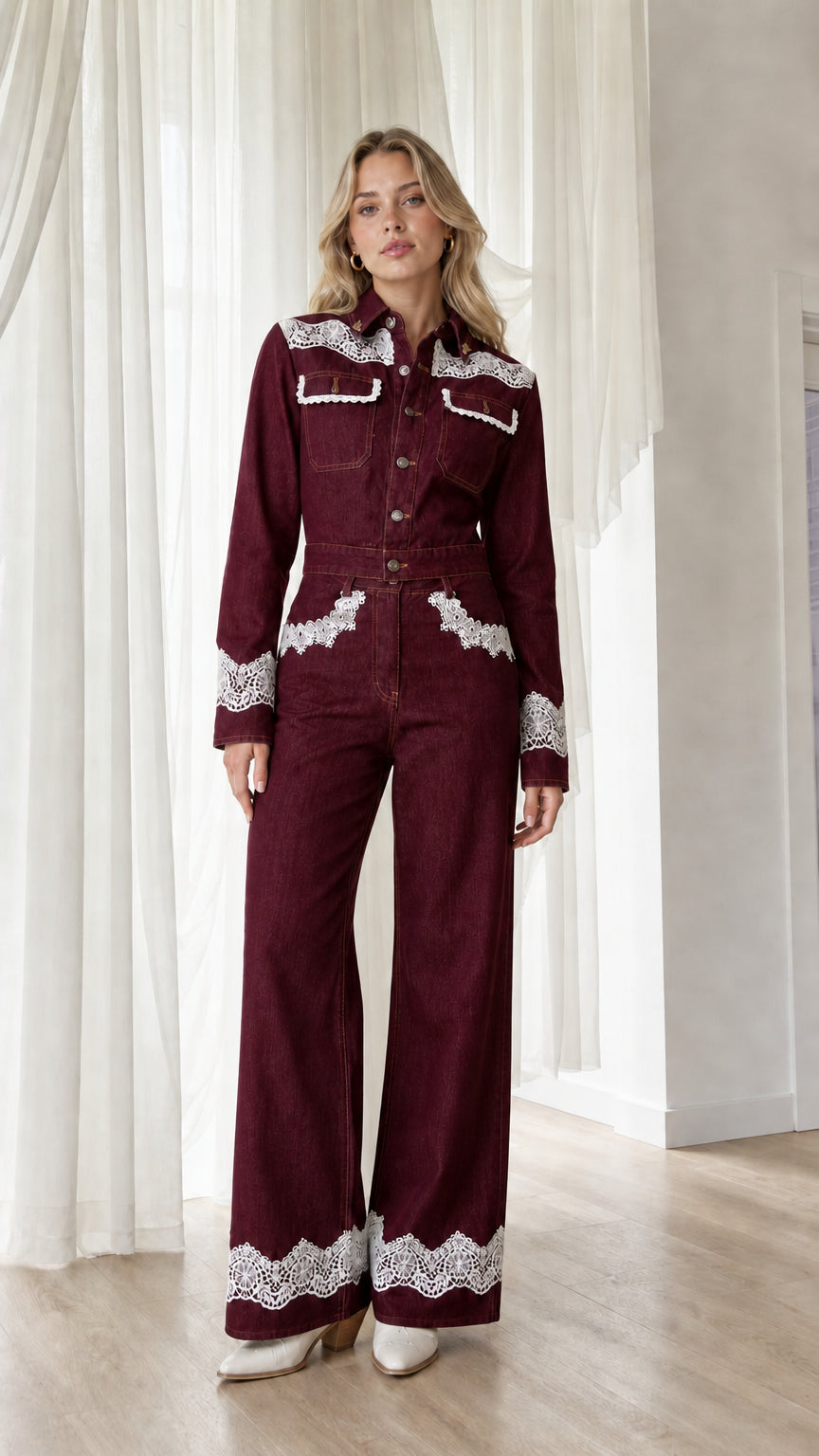 Model wearing burgundy western lace trim denim jumpsuit