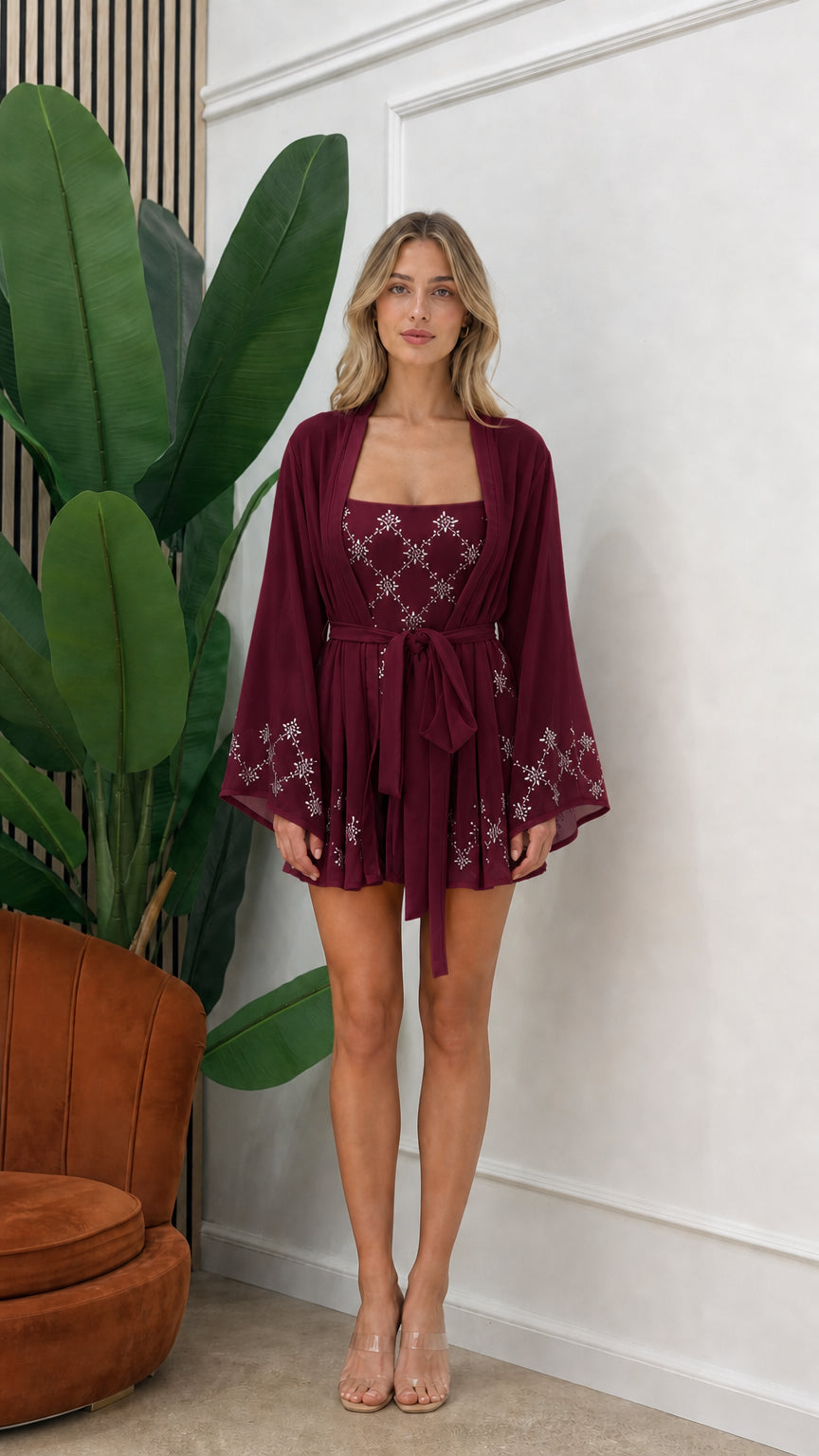 Front view of model wearing burgundy embellished three-piece kimono set