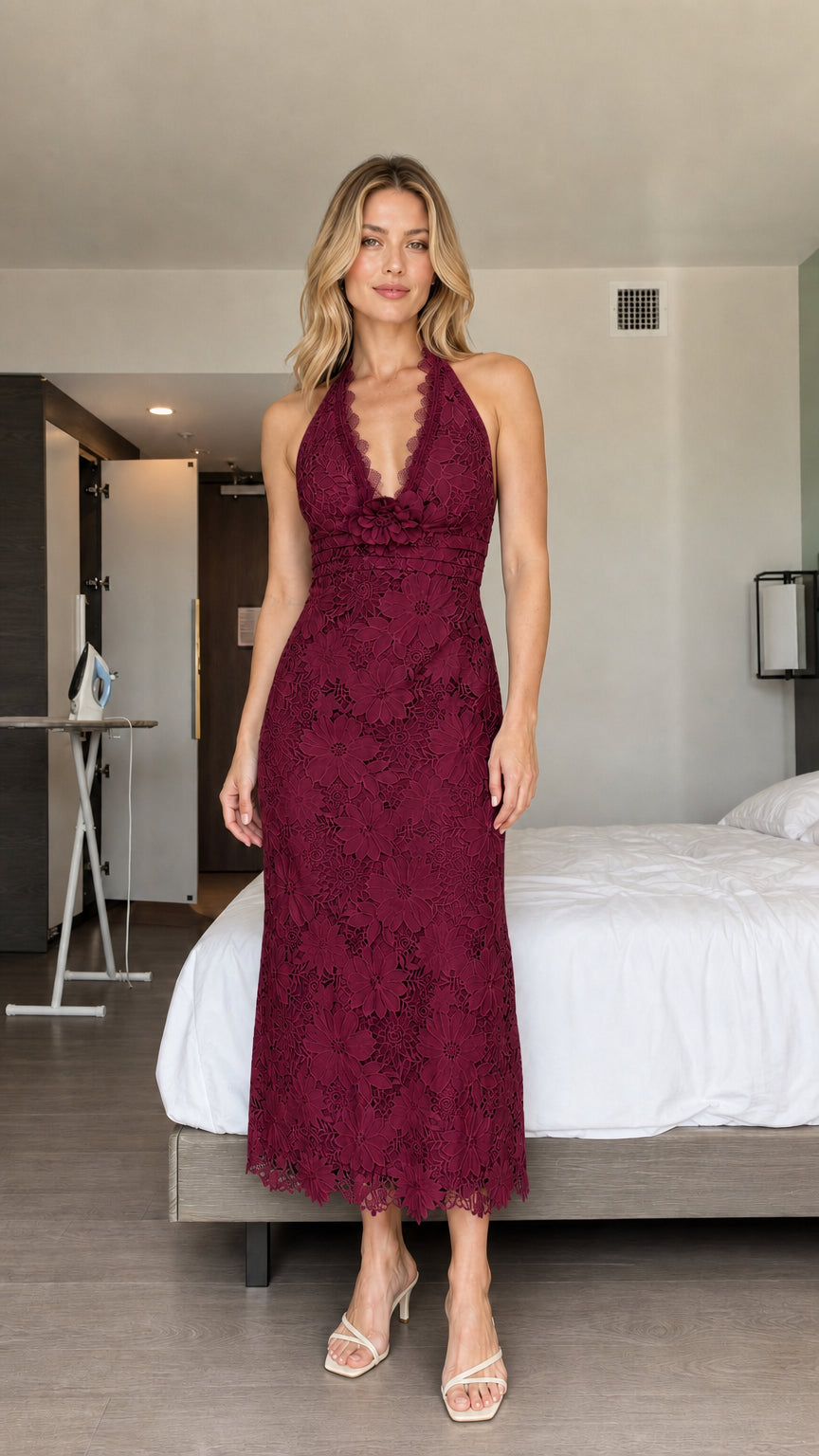 Model wearing burgundy halter floral lace midi dress