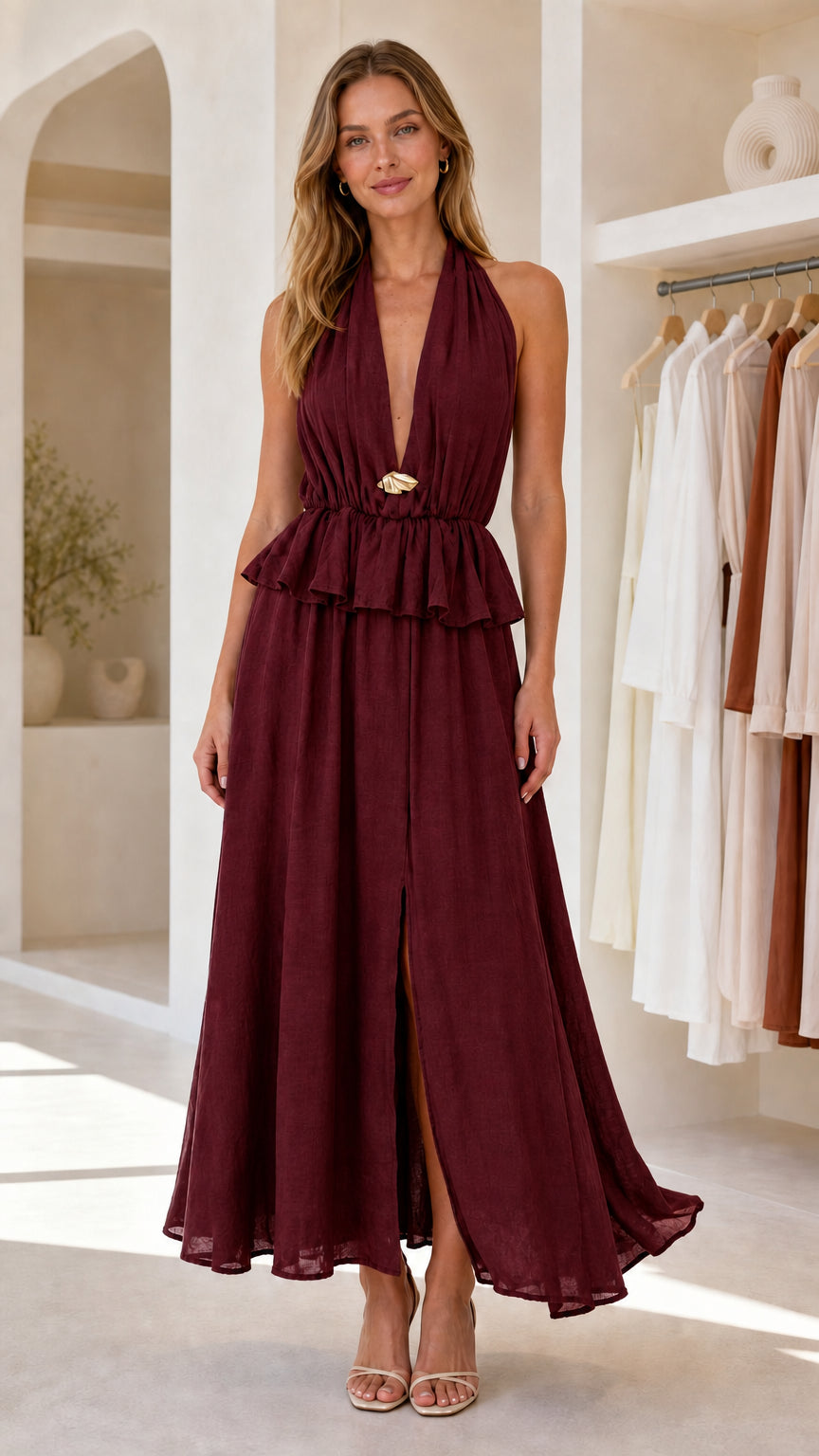 Front view of burgundy halter neck peplum maxi dress