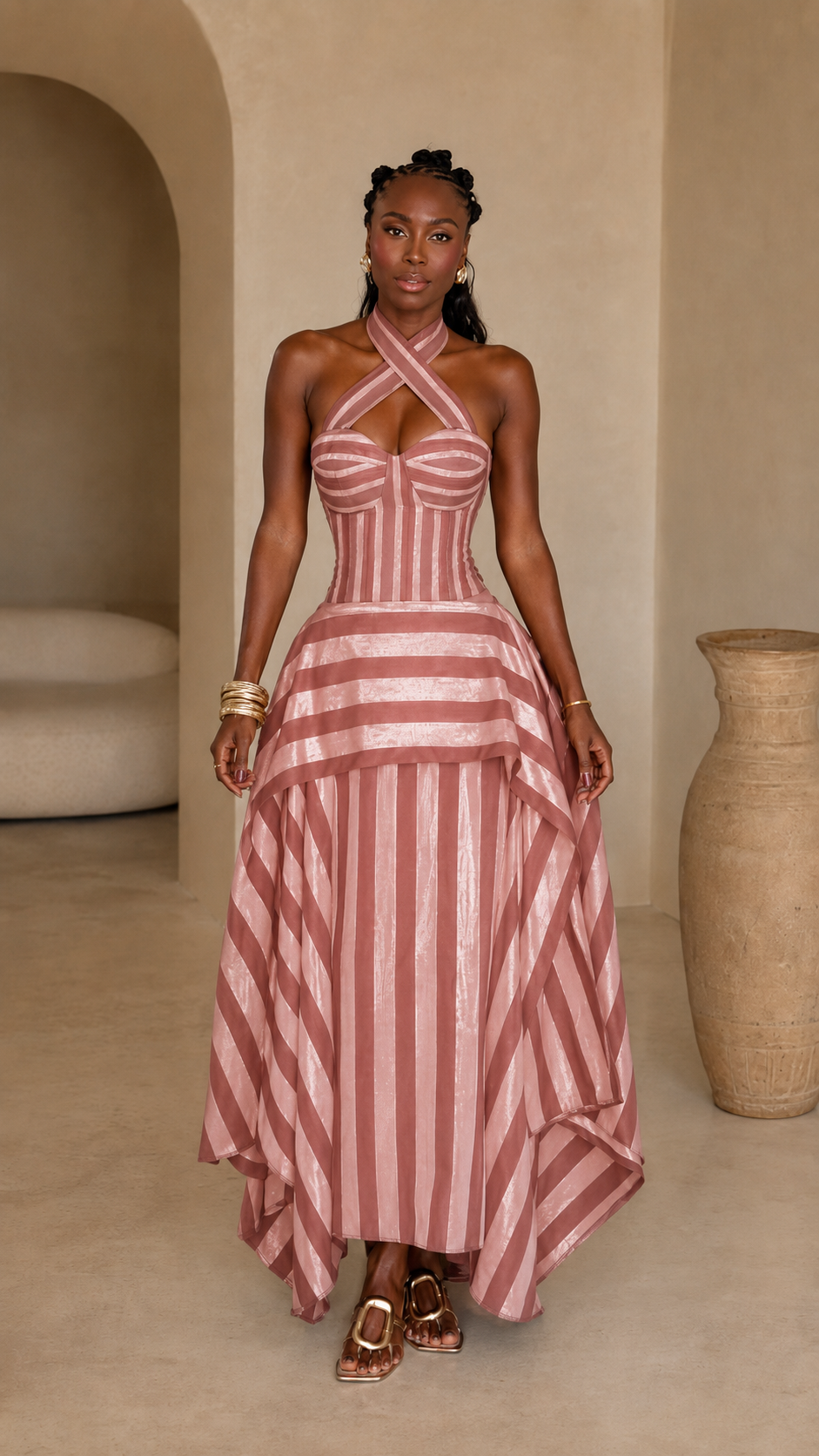 Front view of dusty pink striped cross halter corset maxi dress