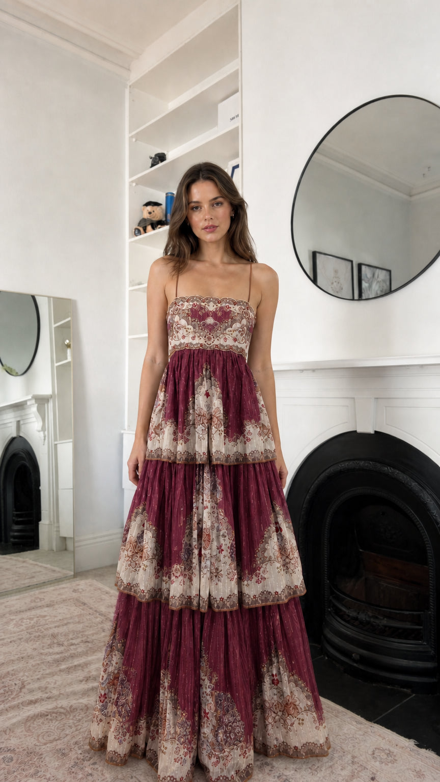 Burgundy floral tiered maxi dress shown from the front