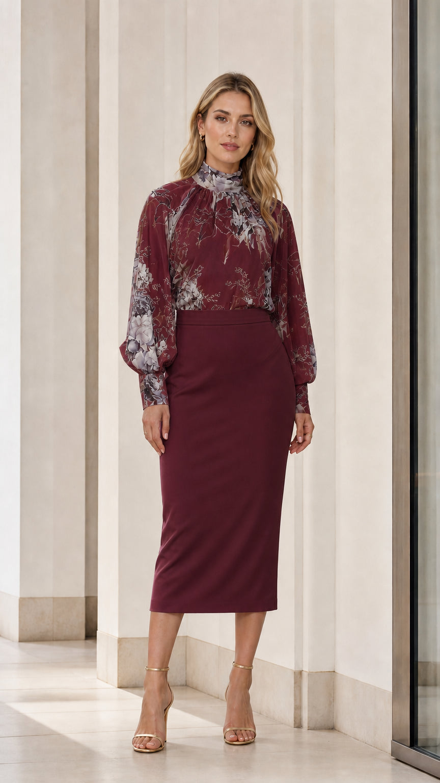 Front view of burgundy floral blouse and skirt set