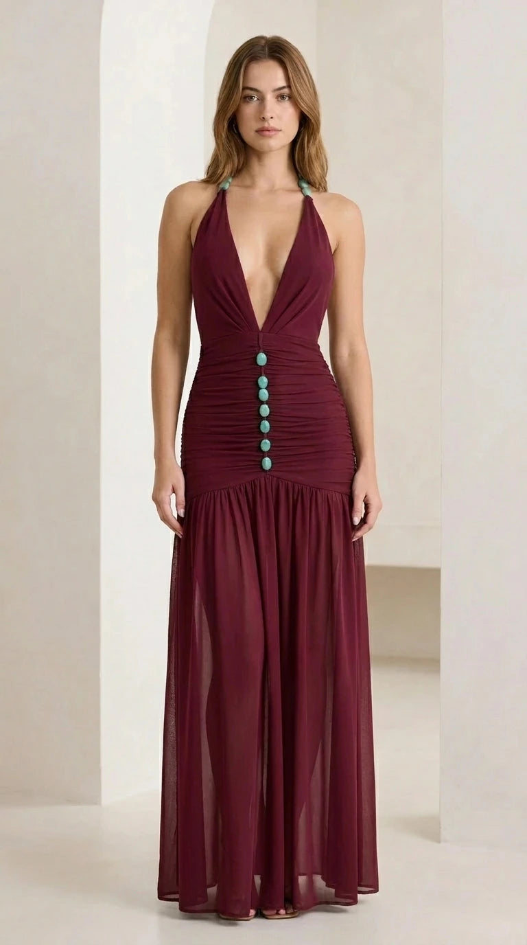 Front view of burgundy halter neck ruched maxi dress