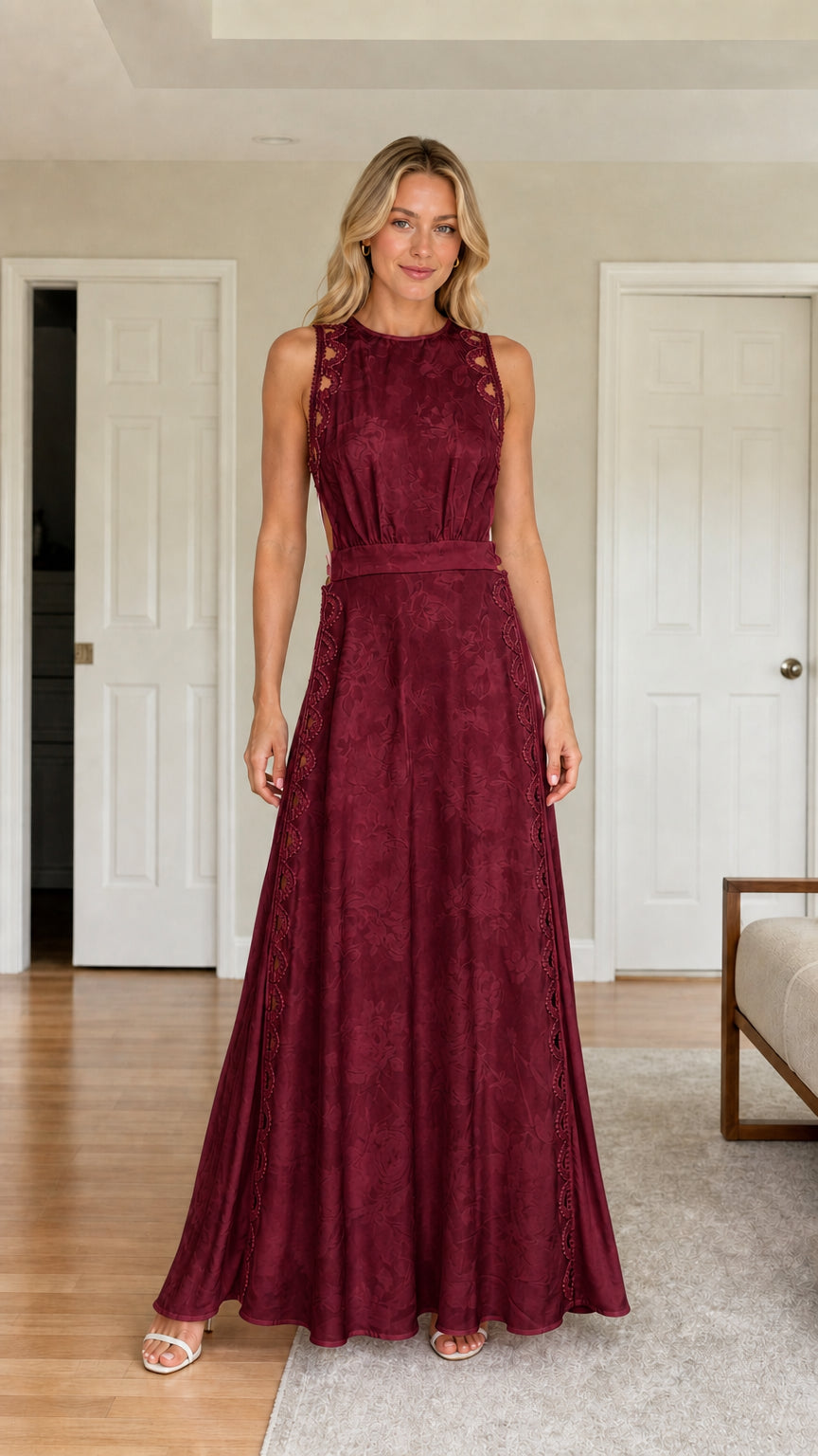 Front view of woman wearing burgundy cutout maxi dress