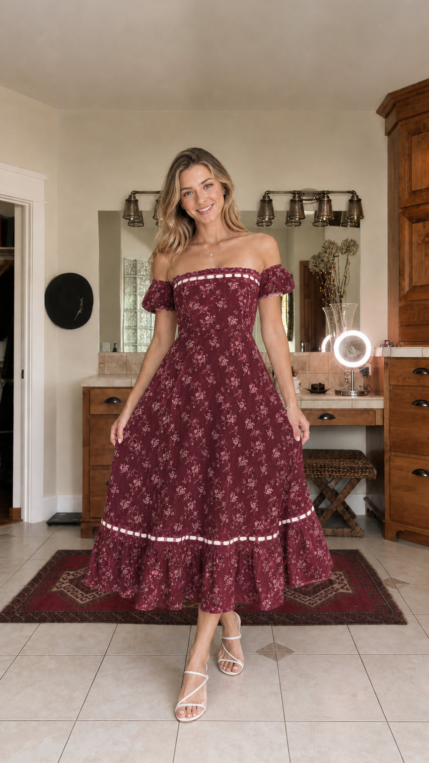 Woman wearing burgundy floral off-the-shoulder midi dress