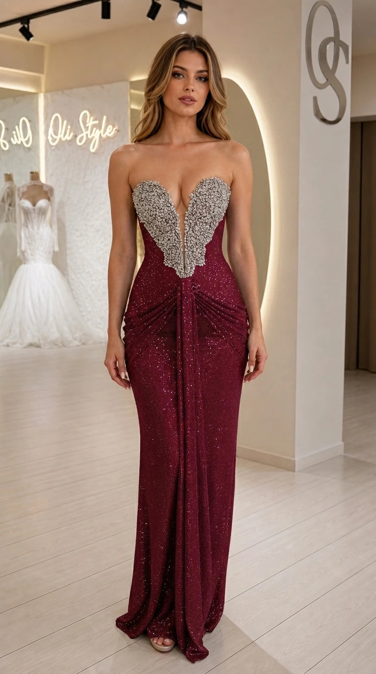 Front view of model wearing burgundy strapless sequin evening dress