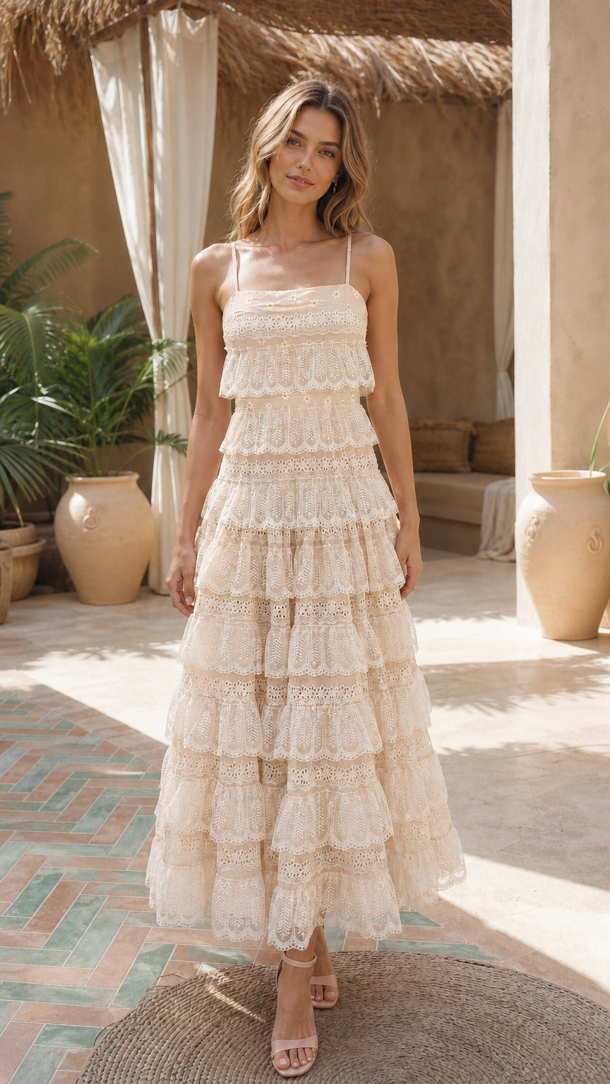 Front view of model wearing beige tiered lace maxi dress