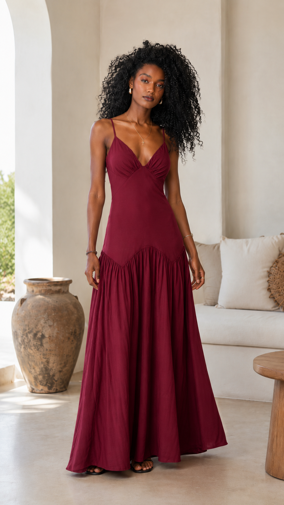 Wine red spaghetti strap maxi dress with flowing skirt and drop waist detail
