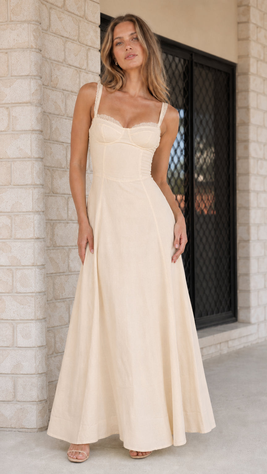 Woman wearing champagne neutral corset maxi dress